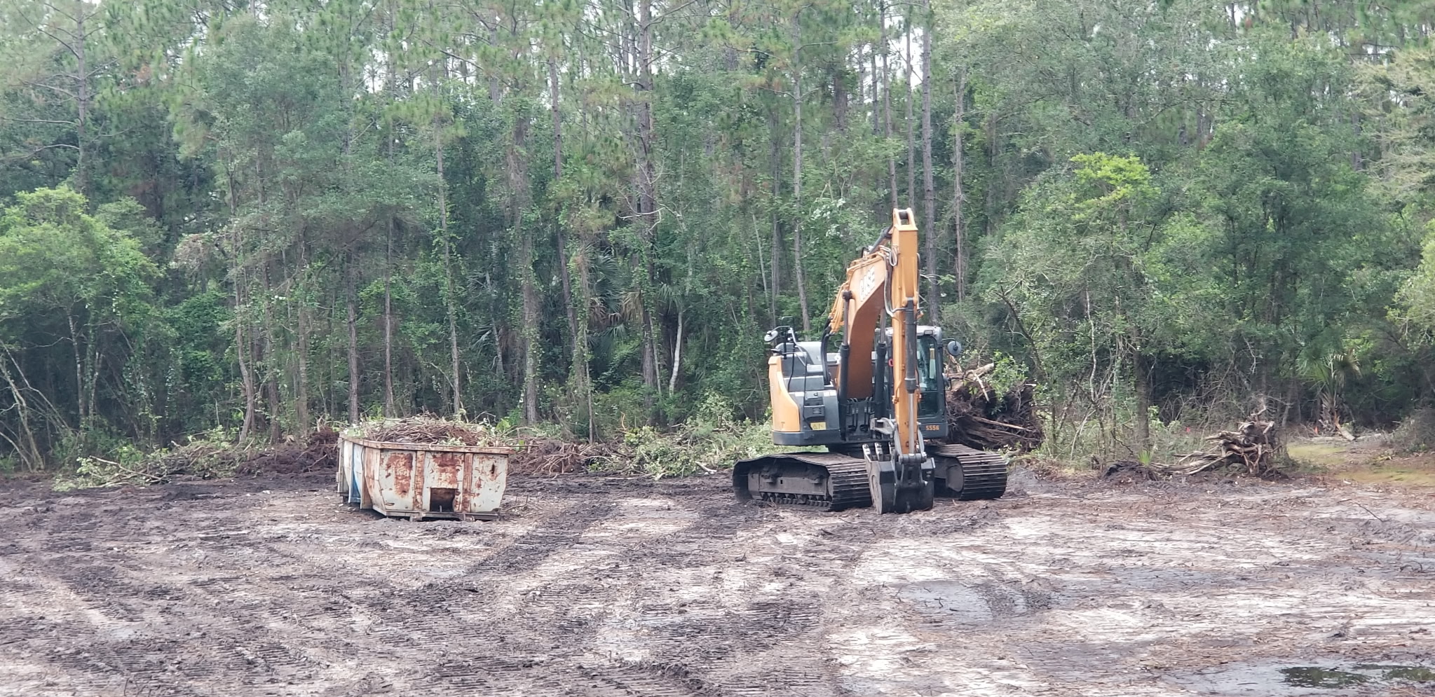 Dozer leveling and grading a cleared home site in Palm Coast