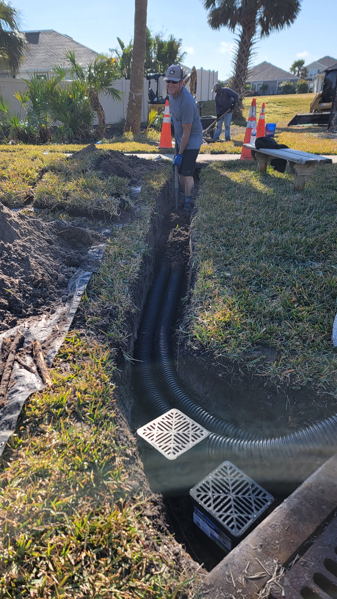 Catch basin and drain pipe installed on a St. Augustine property