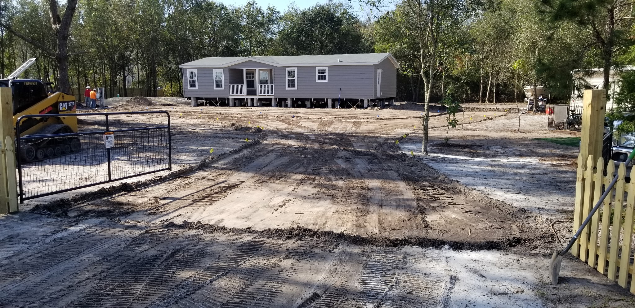 Grading a rural access road on a Palatka property
