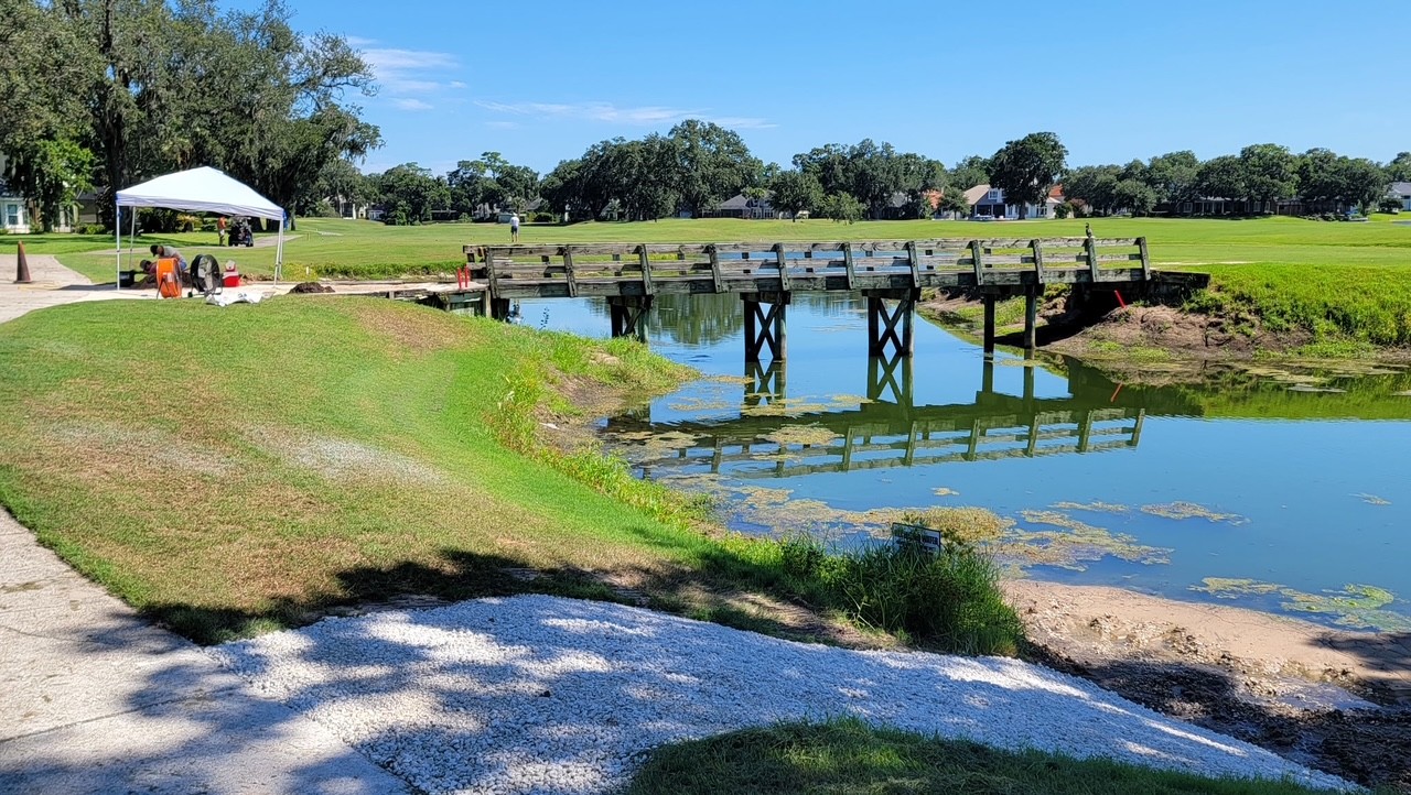 Golf course pond and bridge during a repair project