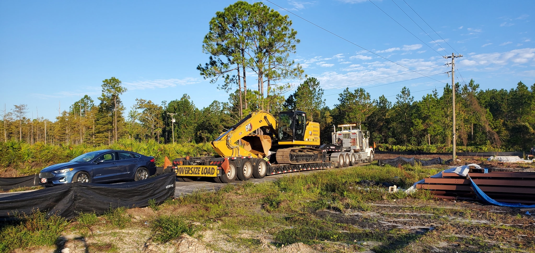 Pond and canal bank excavation on a Flagler Beach waterfront lot